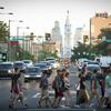 Temple University students cross Broad Street on their way to Main Campus in Philadelphia.