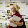 Student walks the halls at Temple University Ambler Campus.