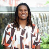 Trae Manzili smiling on campus